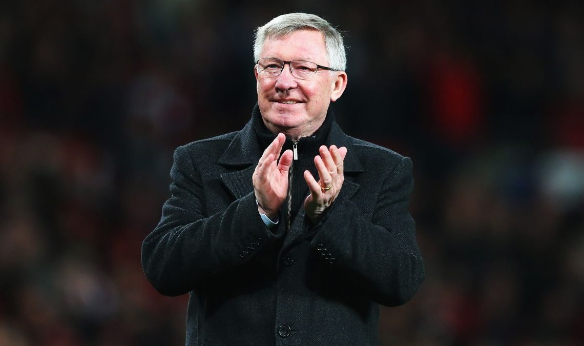 Football manager Alex Ferguson looking happy.